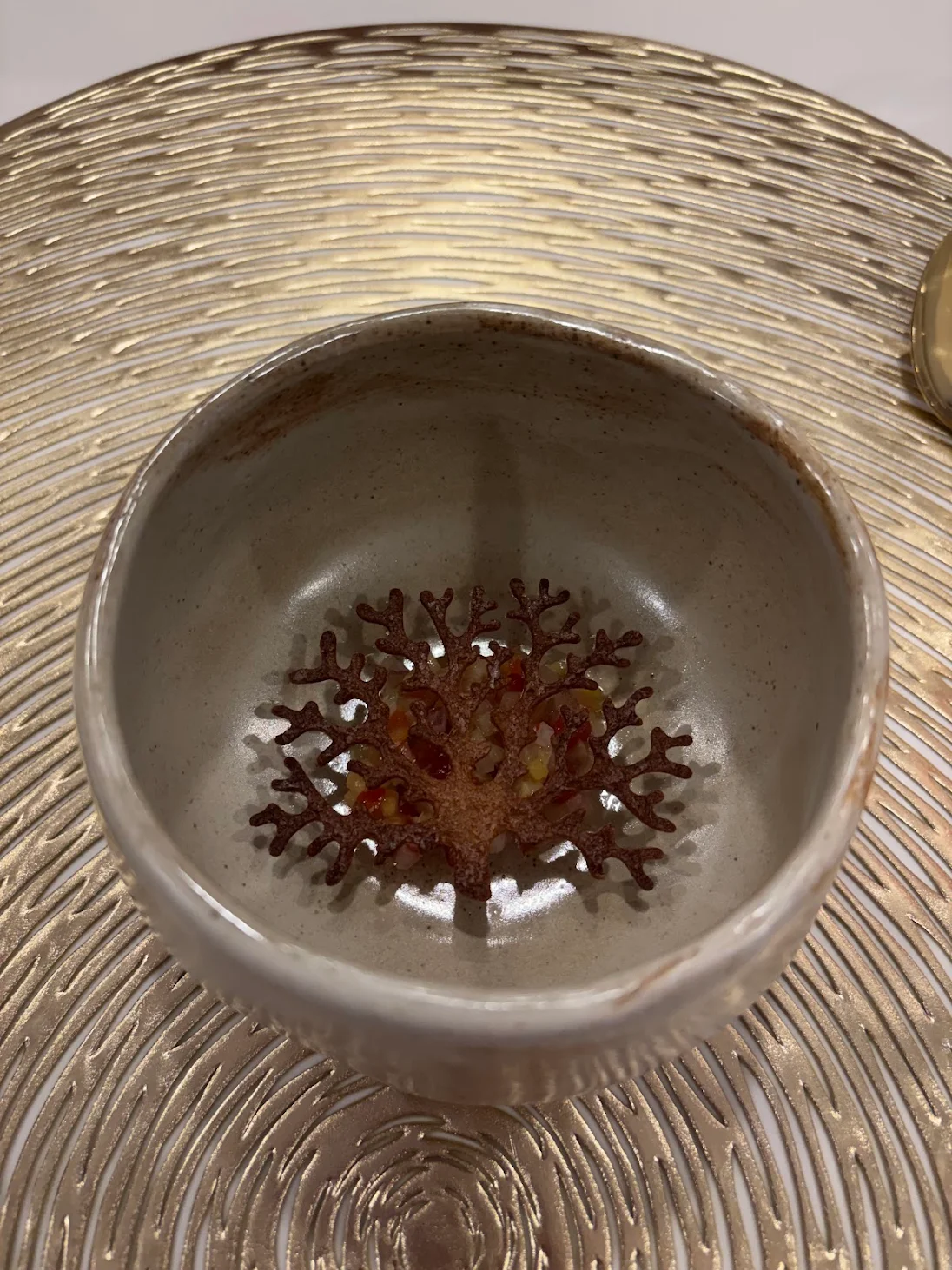 Coral-branch amuse in stoneware bowl at ROCH