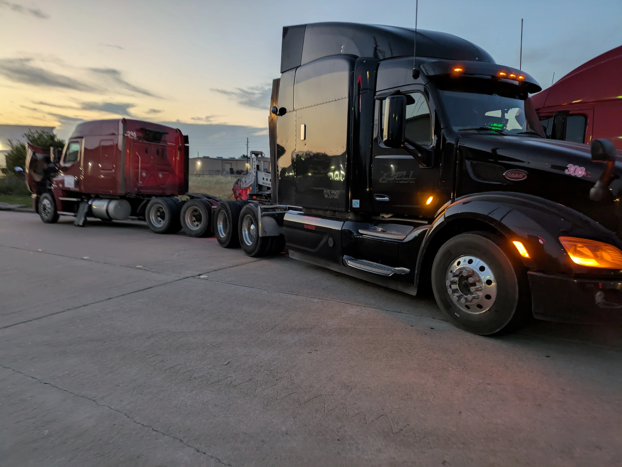 Xcell Transport trucks running with safe spacing on the interstate