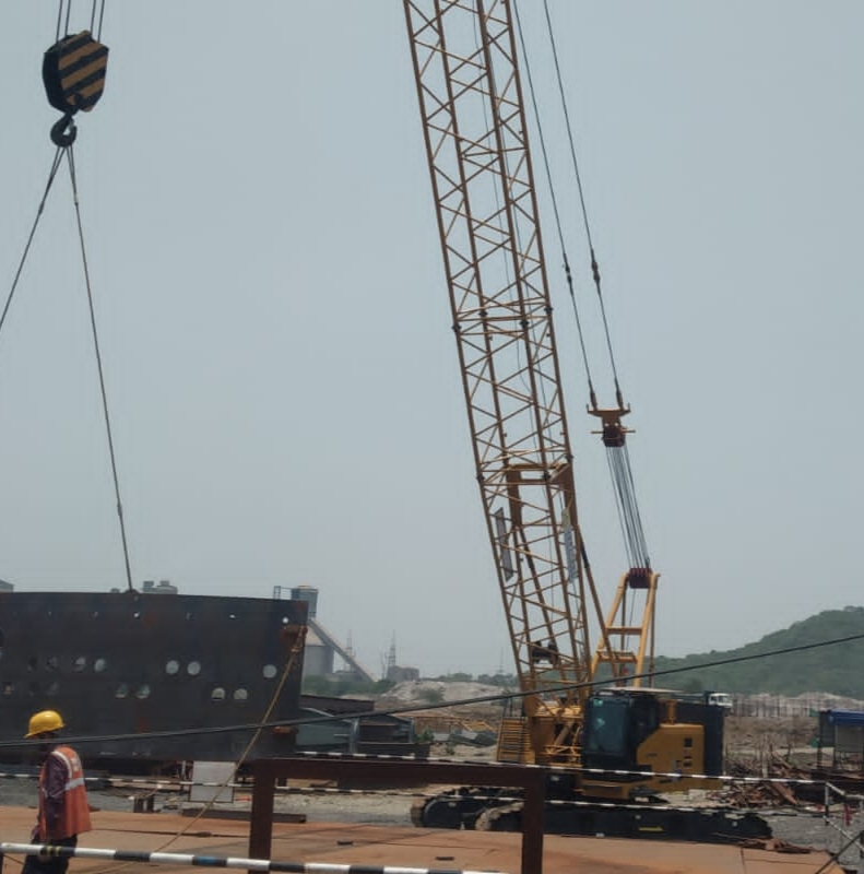 XCMG crawler crane — 80 ton lattice boom at steel site